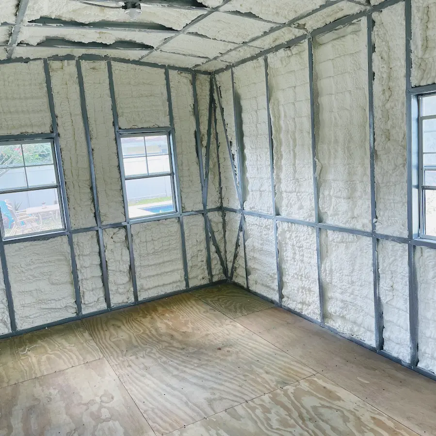Closed-cell spray foam insulation applied to wall cavities in a residential project in Broadlands